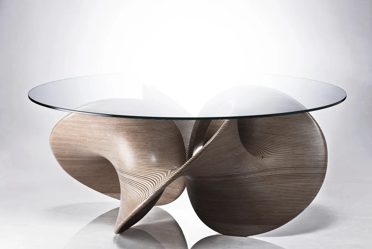 Cave Table This table is in collaboration with a Japanese Furniture Brand + an Architect. The design is inspired by the naturally formed cavity and hollow passages of a cave that can fold its internal structure inside and out. 